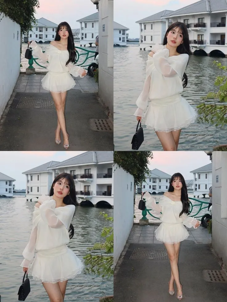 Outfit nữ tính cho bạn gái đi hẹn hò với áo trễ vai trắng và chân váy voan ngắn