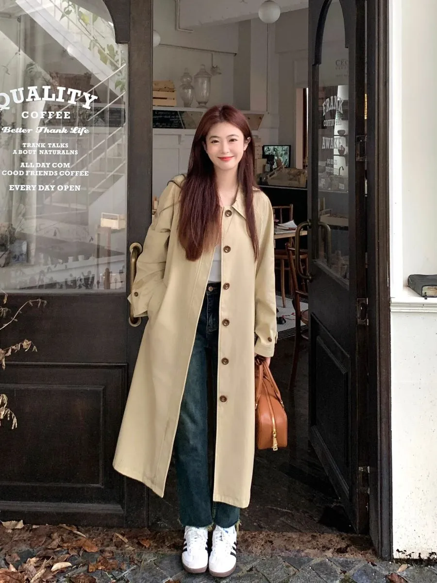 Áo khoác dáng dài và quần skinny jean tạo vẻ ngoài gọn gàng, thanh lịch cho ngày se lạnh